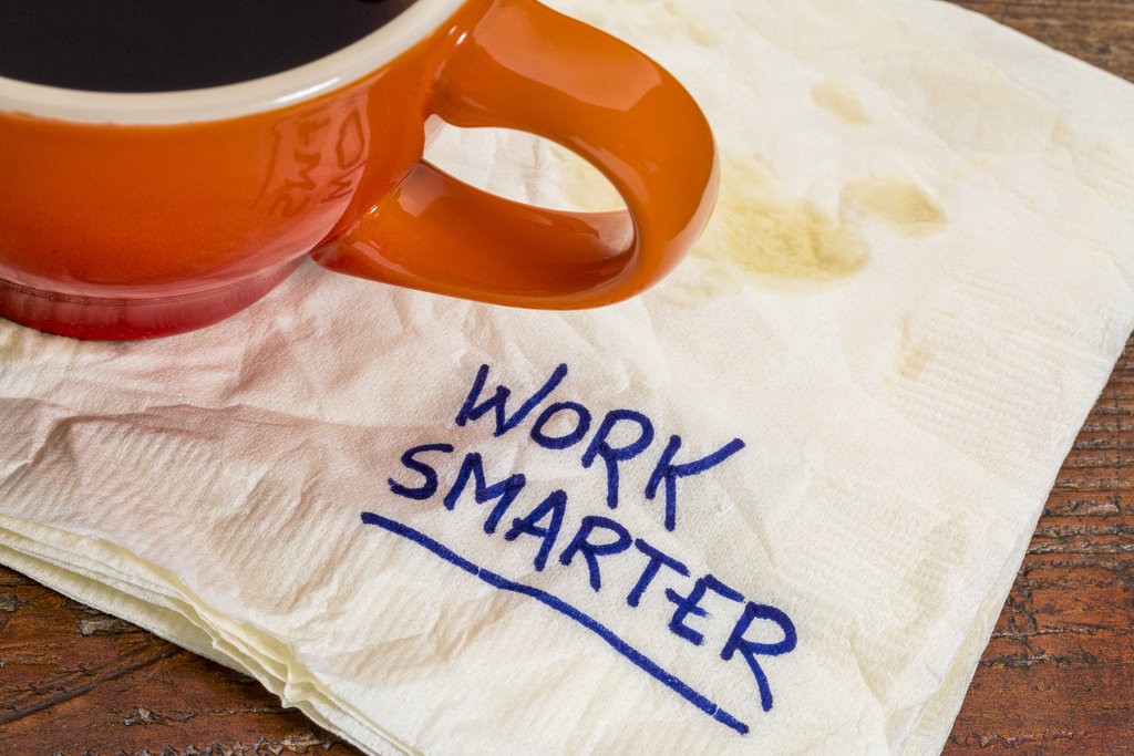 work smarter advice - handwriting on a napkin with cup of coffee